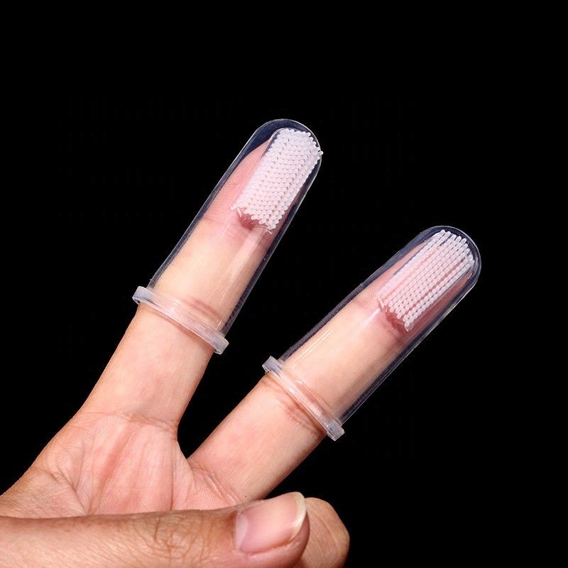 Dents de nettoyage d'outil de chien de silicone de poil nettoyant la brosse à dents orale d'animal familier de doigt de soin de chien